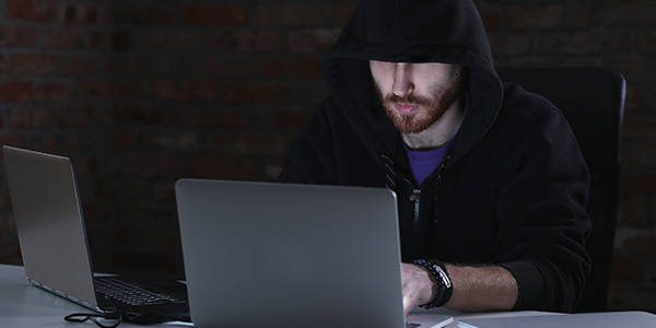 Hacker in front of his computer